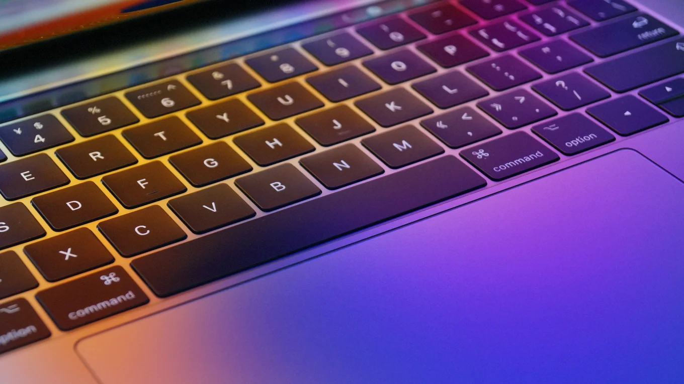 Laptop keyboard with colorful lighting.